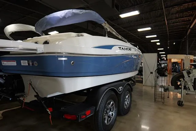 Slide: The Image of 2024 Tahoe TAHOE210SILJ boat on trailer in showroom. - 4