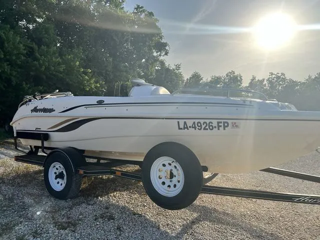 Slide: The Image of 2006 Hurricane 172GS boat on trailer, side view, sunny day. - 4