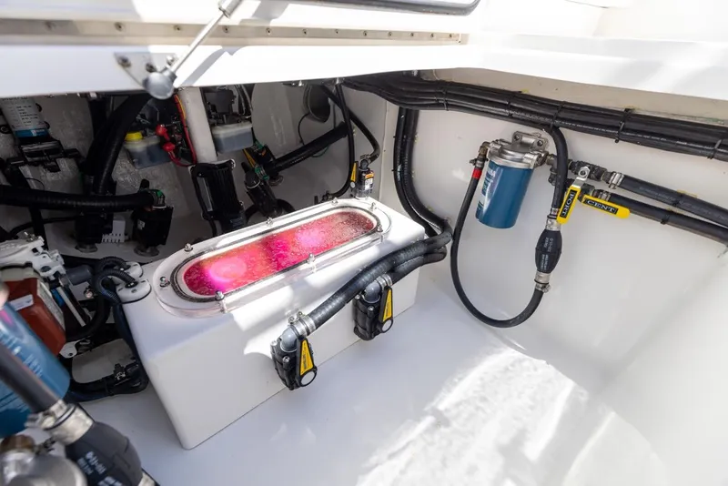 Slide: The Image of Engine compartment of a 2021 Contender 39FA Fish Around boat. - 19