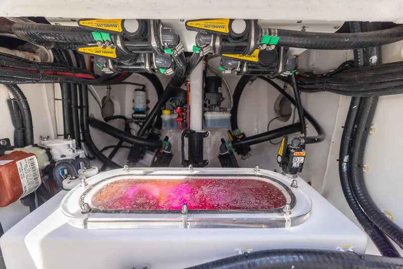 Slide: The Image of Engine compartment of a 2021 Contender 39FA Fish Around boat. - 20