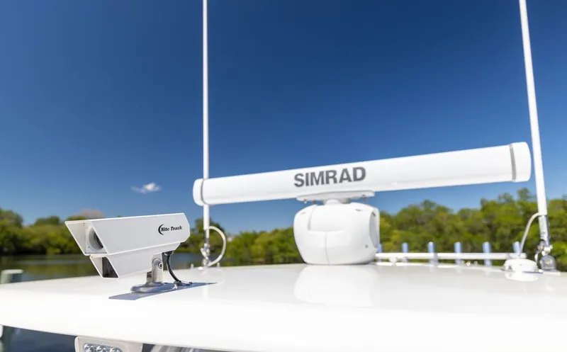 Slide: The Image of 2021 Contender 39FA Fish Around boat with Simrad radar and navigation equipment. - 21