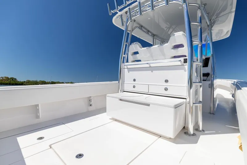 Slide: The Image of 2021 Contender 39FA Fish Around boat deck with seating and storage. - 23