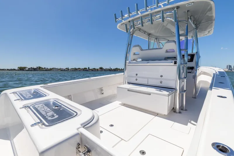 Slide: The Image of 2021 Contender 39FA Fish Around boat interior on a sunny day. - 33