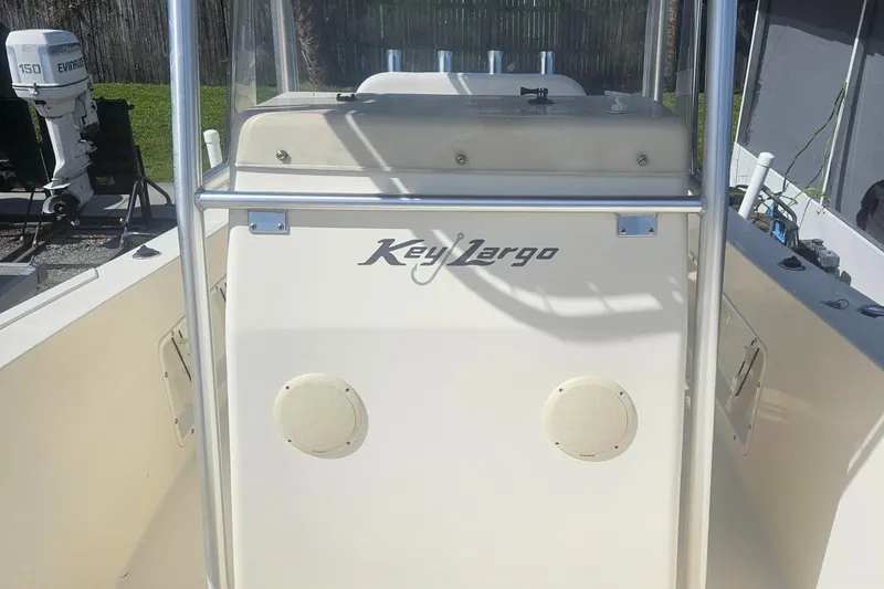 Slide: The Image of 2014 Key Largo 2100 boat console with speakers and steering wheel. - 10