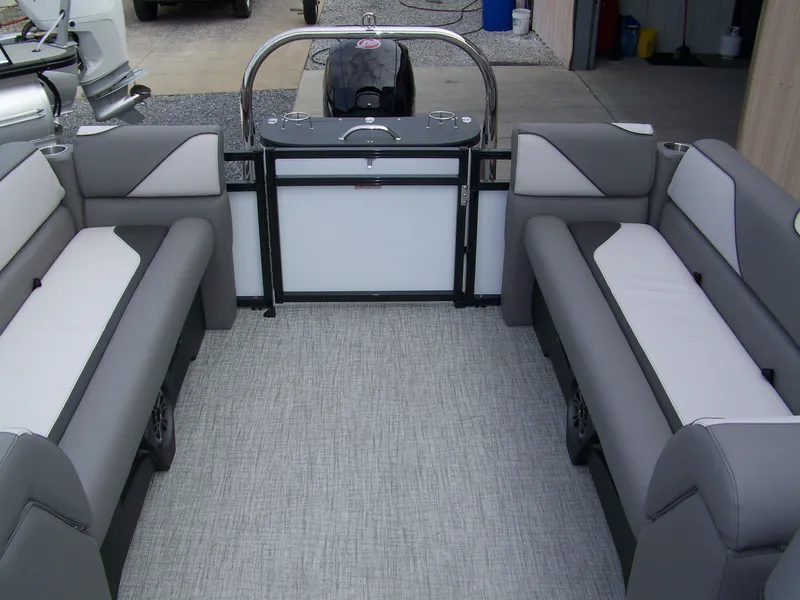 Slide: The Image of 2024 Avalon VENTURE 85 QL pontoon boat interior with gray and white seating. - 10