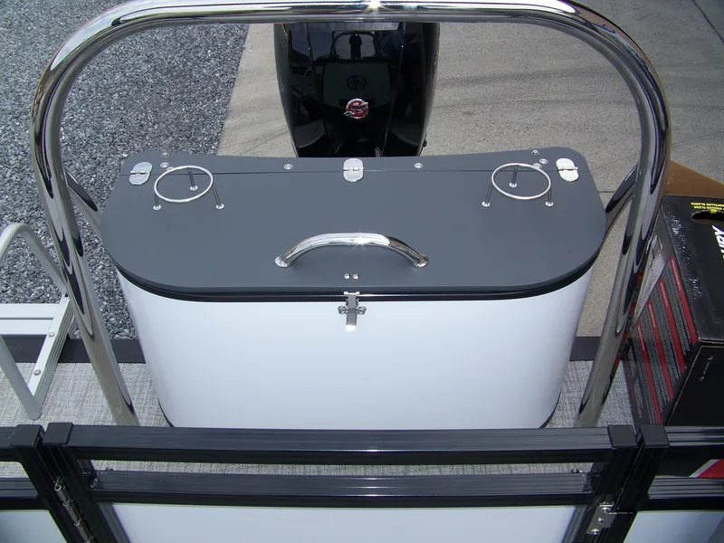 Slide: The Image of 2024 Avalon VENTURE 85 QL boat rear view with motor and railing. - 12