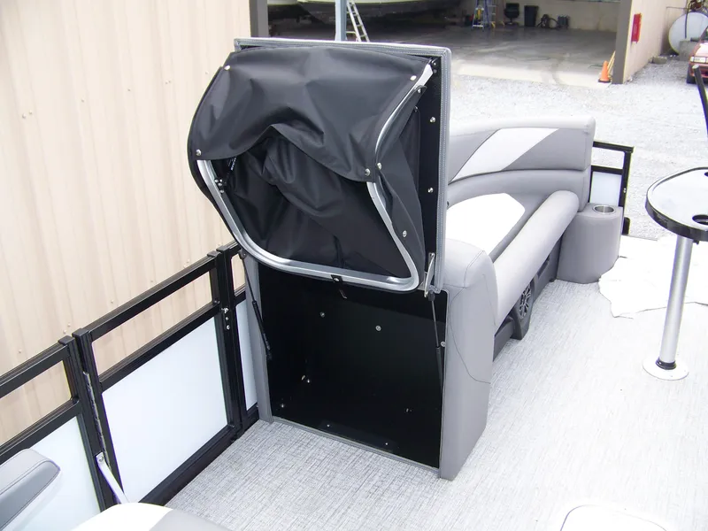 Slide: The Image of 2024 Avalon VENTURE 85 QL pontoon boat with open storage compartment. - 14