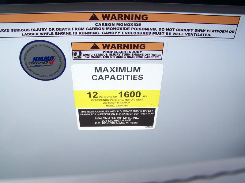 Slide: The Image of 2024 Avalon VENTURE 85 QL maximum capacities warning label, 12 persons or 1600 lbs. - 8