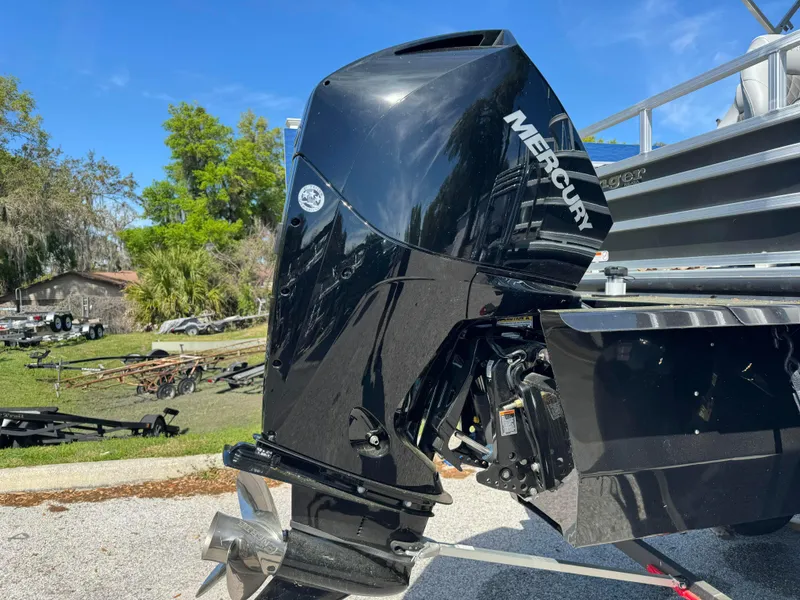 Slide: The Image of 2024 Ranger Reata 223FC with Mercury outboard motor. - 2