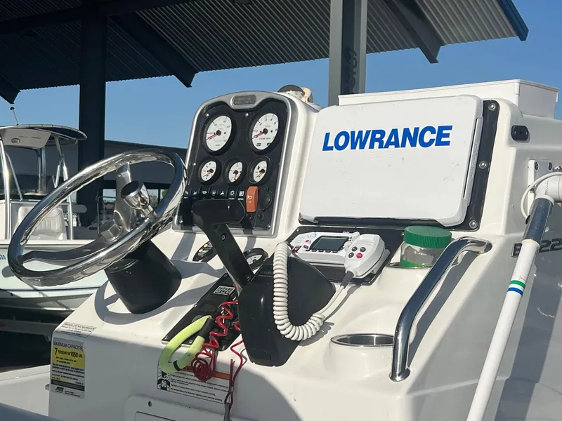 Slide: The Image of 2013 Sea Hunt BX 22 Pro boat dashboard with Lowrance navigation system. - 5