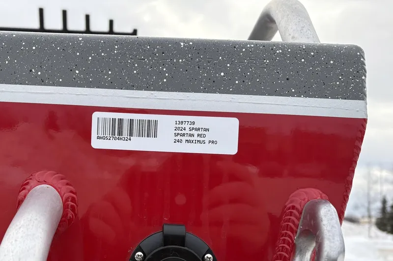 Slide: The Image of 2024 Spartan 240 Maximus Pro label on red equipment with barcode. - 17