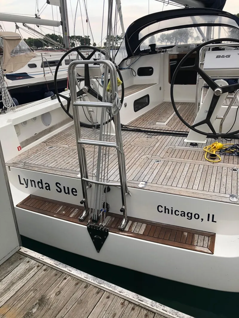 Slide: The Image of Arcona 435 sailboat, 2020 model, docked in Chicago with dual steering wheels. - 22