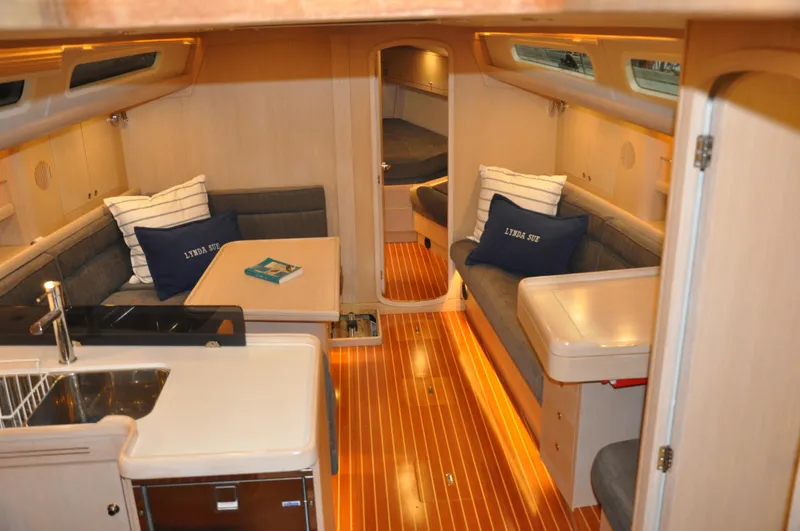 Slide: The Image of Interior of 2020 Arcona 435 yacht with modern kitchen and cozy seating area. - 26
