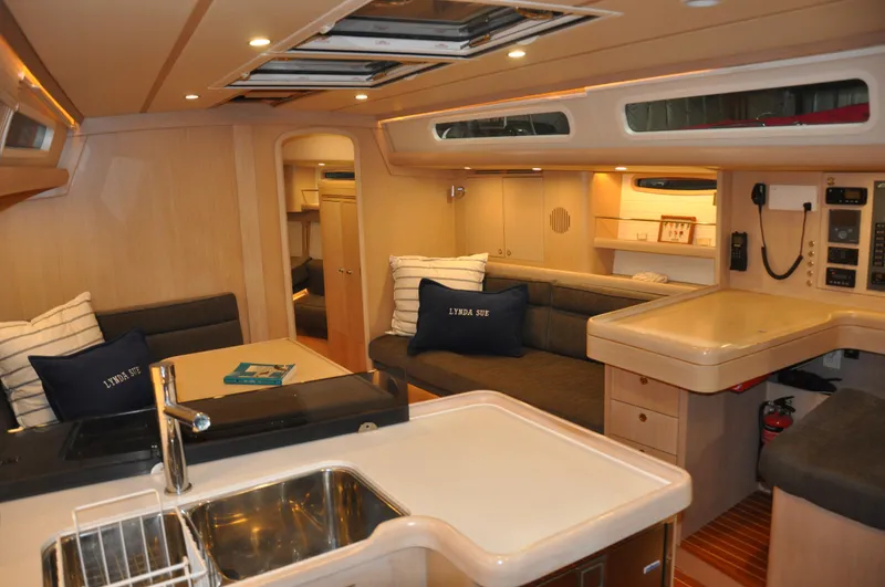 Slide: The Image of Interior of 2020 Arcona 435 yacht with modern kitchen and seating area. - 30