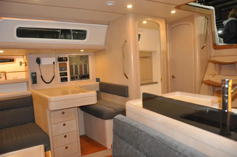 Slide: The Image of Interior of 2020 Arcona 435 yacht with modern design and cozy seating area. - 38