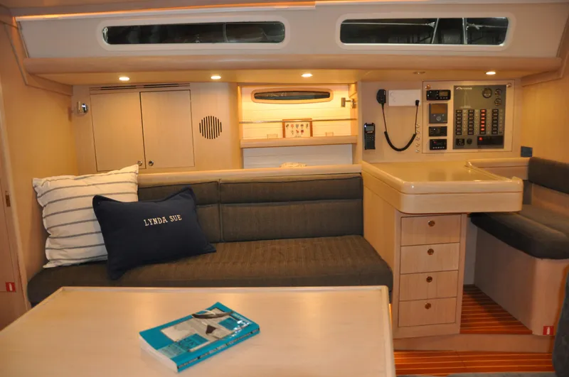 Slide: The Image of Interior of 2020 Arcona 435 yacht with cozy seating and navigation panel. - 39