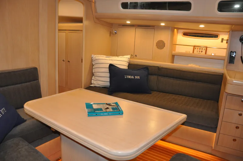 Slide: The Image of Interior of 2020 Arcona 435 yacht with cozy seating and dining area. - 40