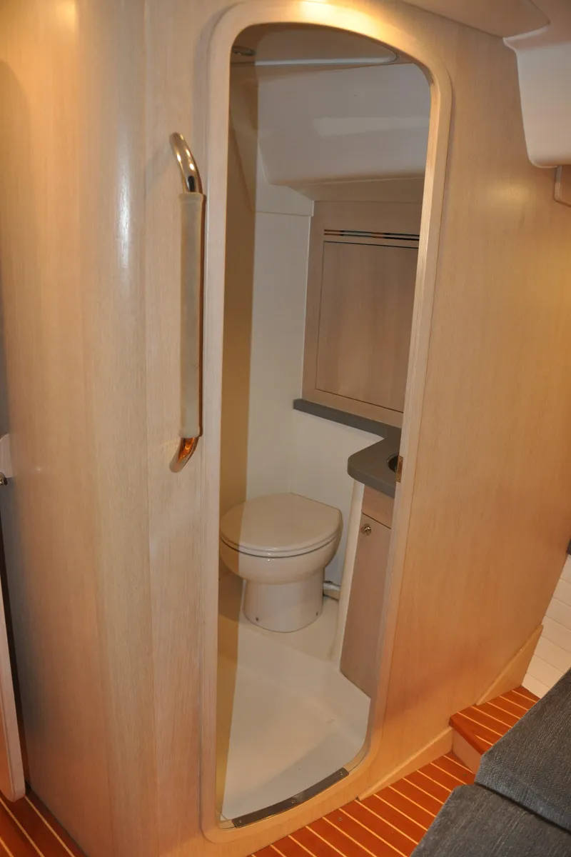 Slide: The Image of 2020 Arcona 435 yacht bathroom with modern design and wooden accents. - 45