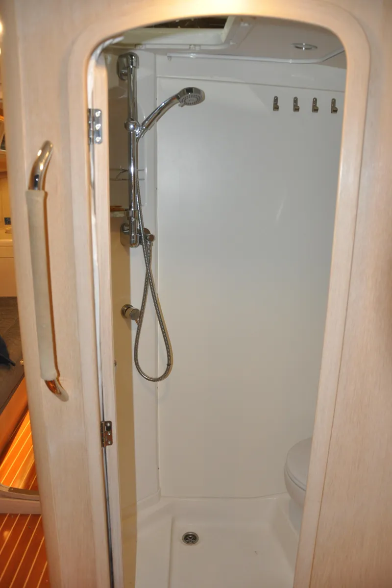 Slide: The Image of Compact shower area in a 2020 Arcona 435 yacht, featuring modern fixtures. - 49
