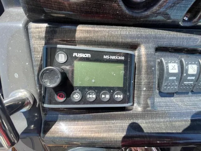 Slide: The Image of Fusion MS-NRX300 marine stereo on 2019 Monterey 295 dashboard. - 26