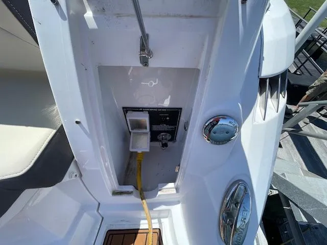 Slide: The Image of 2019 Monterey 295 boat stern with power connection and deck details. - 5