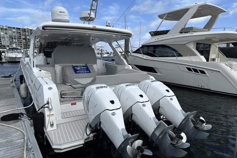 Slide: The Image of Azimut 40 Verve 2020 yacht with triple outboard engines docked at marina. - 13