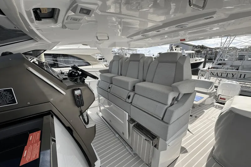 Slide: The Image of Interior of 2020 Azimut 40 Verve yacht with plush seating and modern controls. - 18