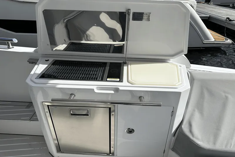 Slide: The Image of Outdoor kitchen on 2020 Azimut 40 Verve yacht with grill and cutting board. - 21