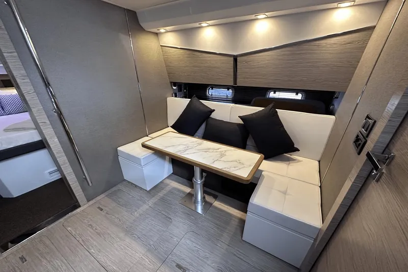 Slide: The Image of Luxurious interior of 2020 Azimut 40 Verve yacht with elegant seating and table. - 25