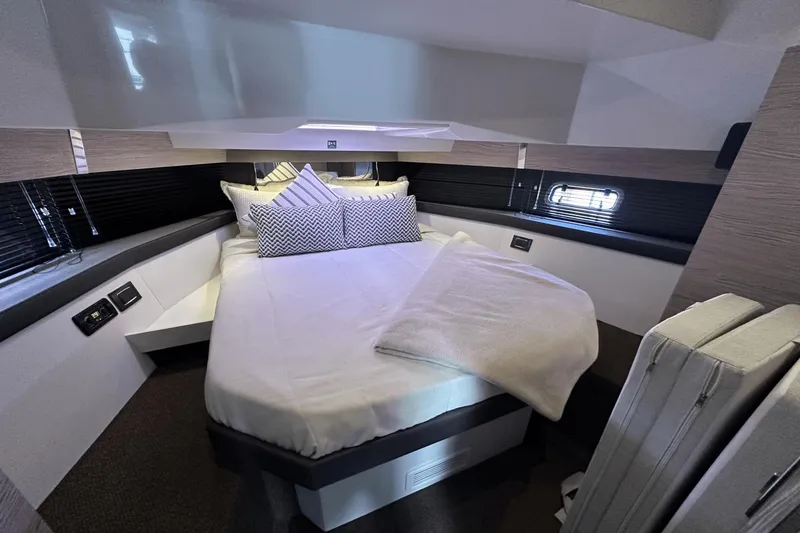 Slide: The Image of Luxurious cabin interior of 2020 Azimut 40 Verve yacht with modern bedding. - 26