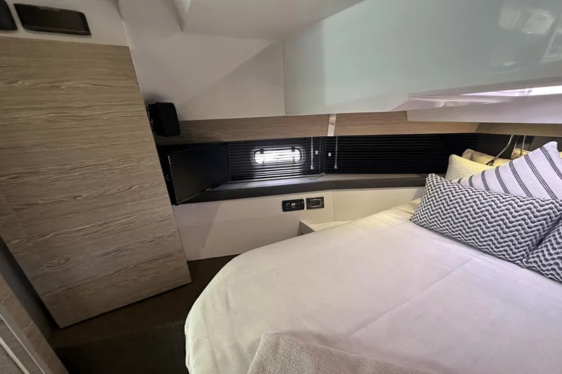 Slide: The Image of Luxurious cabin interior of 2020 Azimut 40 Verve yacht with modern design and cozy bedding. - 27