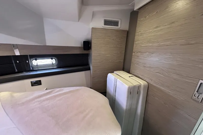 Slide: The Image of Interior cabin of 2020 Azimut 40 Verve yacht with modern wood paneling. - 28