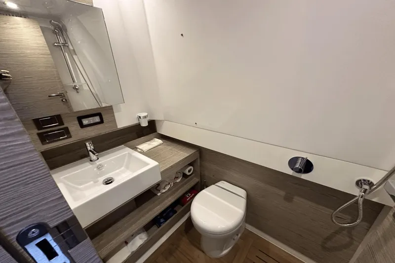 Slide: The Image of Modern bathroom in 2020 Azimut 40 Verve yacht with sink, toilet, and shower. - 29