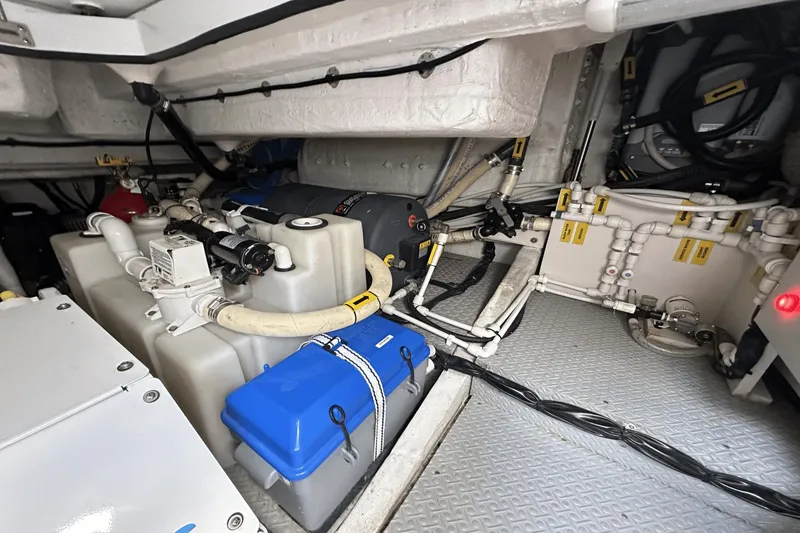 Slide: The Image of Engine room of 2020 Azimut 40 Verve yacht with visible machinery and piping. - 31