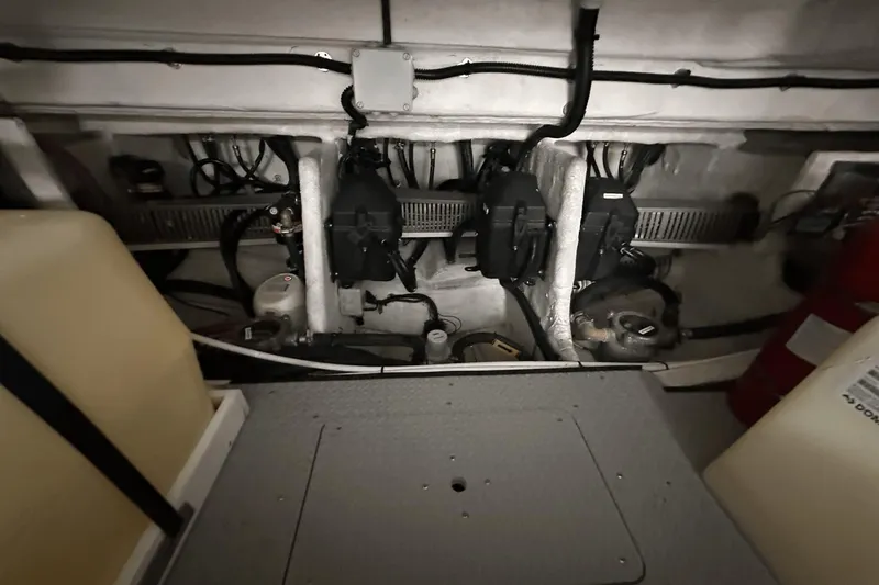 Slide: The Image of Engine room of 2020 Azimut 40 Verve yacht, showcasing mechanical components and wiring. - 33