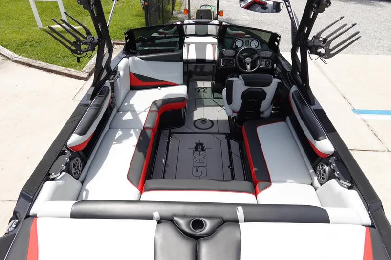 Slide: The Image of 2019 Axis T22 boat interior with white, black, and red seating. - 13