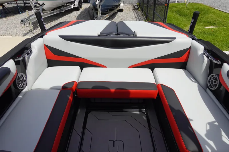 Slide: The Image of 2019 Axis T22 boat interior with red, black, and white seating. - 14