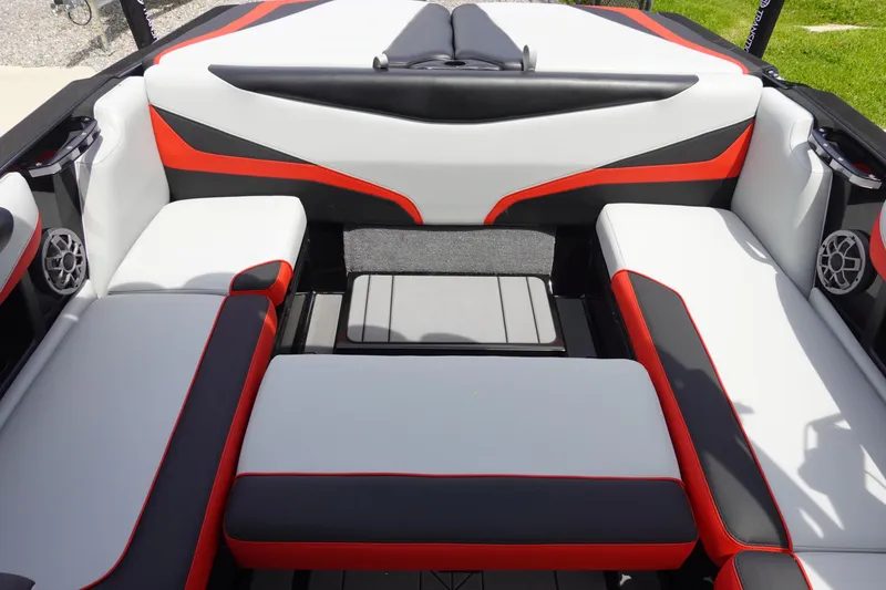 Slide: The Image of 2019 Axis T22 boat interior with red, black, and white seating. - 15