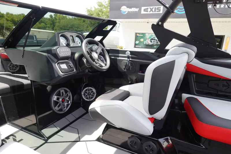 Slide: The Image of 2019 Axis T22 boat interior with modern dashboard and comfortable seating. - 21