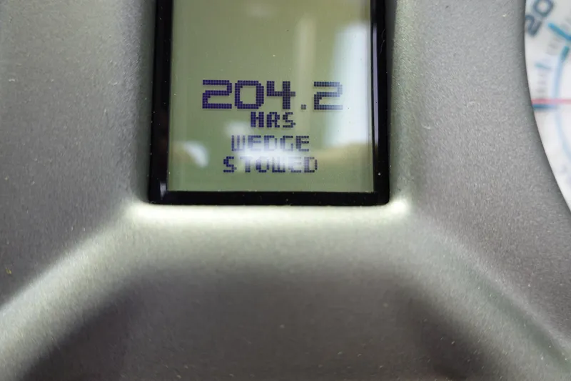 Slide: The Image of Close-up of 2019 Axis T22 display showing 204.2 hours and wedge stowed. - 23