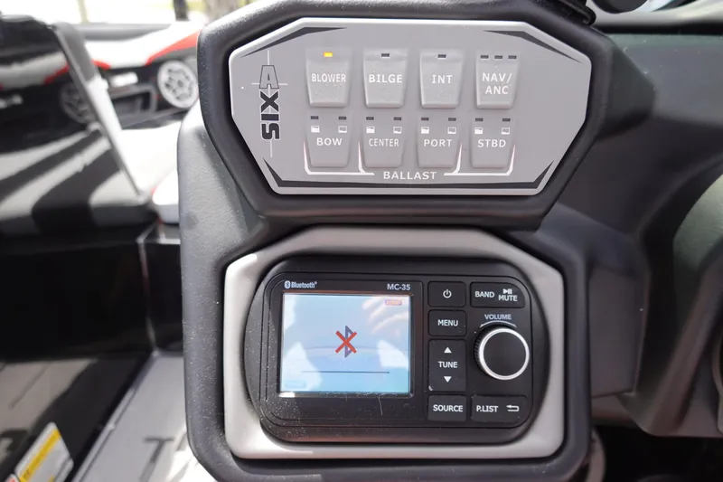 Slide: The Image of Control panel of a 2019 Axis T22 boat with Bluetooth and ballast switches. - 24