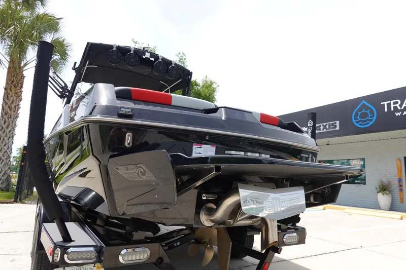 Slide: The Image of 2019 Axis T22 boat rear view at dealership. - 9