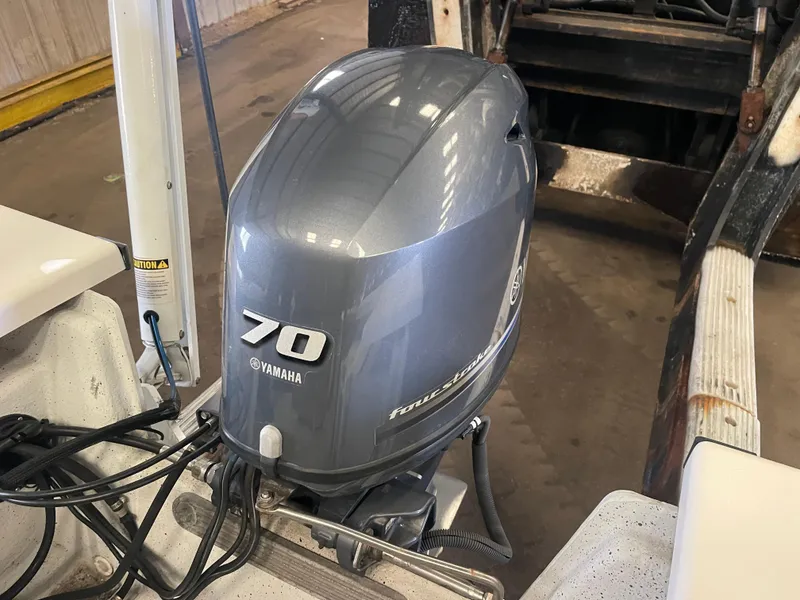 Slide: The Image of Yamaha 70 horsepower outboard motor on 2013 KenCraft Bay Rider 1860 boat. - 15