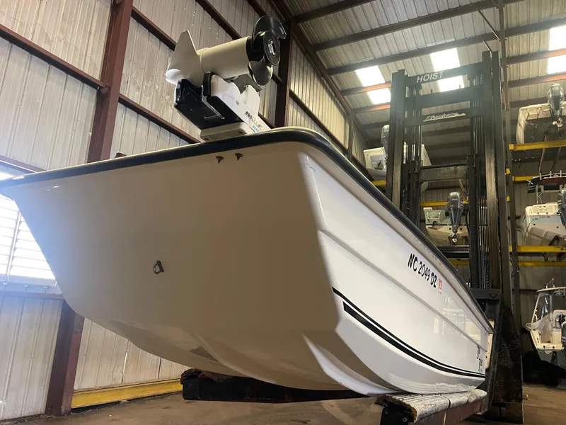 Slide: The Image of 2013 KenCraft Bay Rider 1860 boat in warehouse, elevated on forklift. - 4