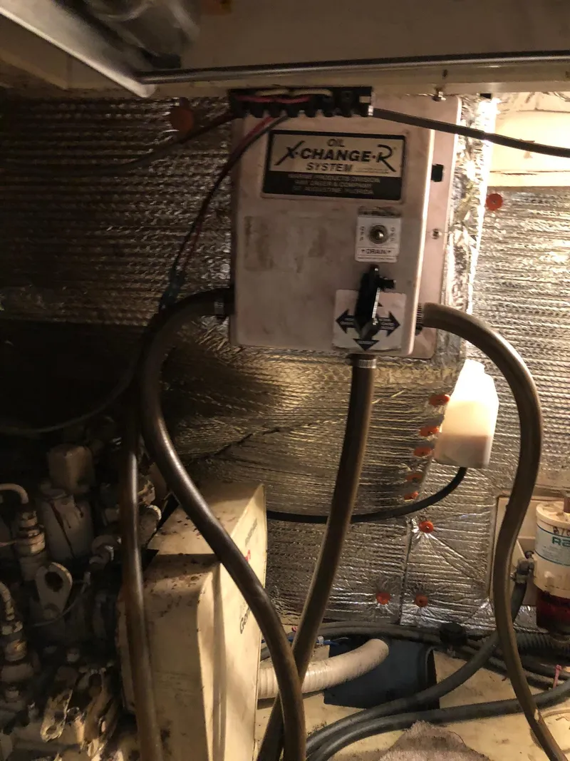 Slide: The Image of 1986 Chris-Craft Catalina engine room with X-Change-R oil change system. - 47