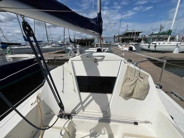 Slide: The Image of 2010 Seaward 26RK sailboat docked at a marina on a sunny day. - 12