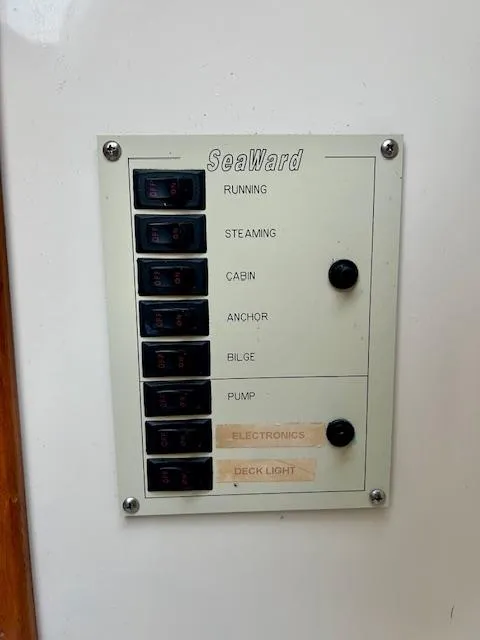 Slide: The Image of Control panel of a 2010 Seaward 26RK boat with labeled switches. - 29