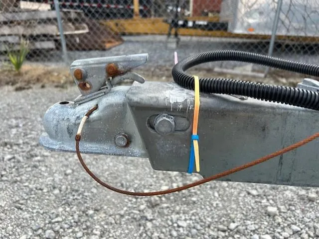 Slide: The Image of Close-up of a Seaward 26RK 2010 trailer hitch with wiring and rust. - 37