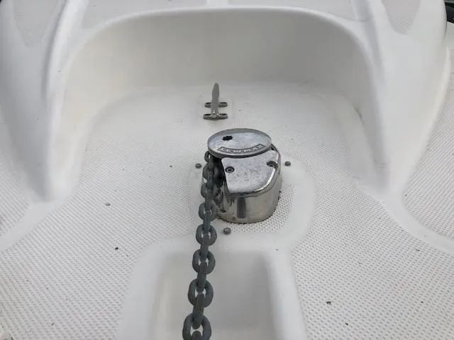 Slide: The Image of Anchor chain and windlass on a 2007 Bayliner 275 boat deck. - 29