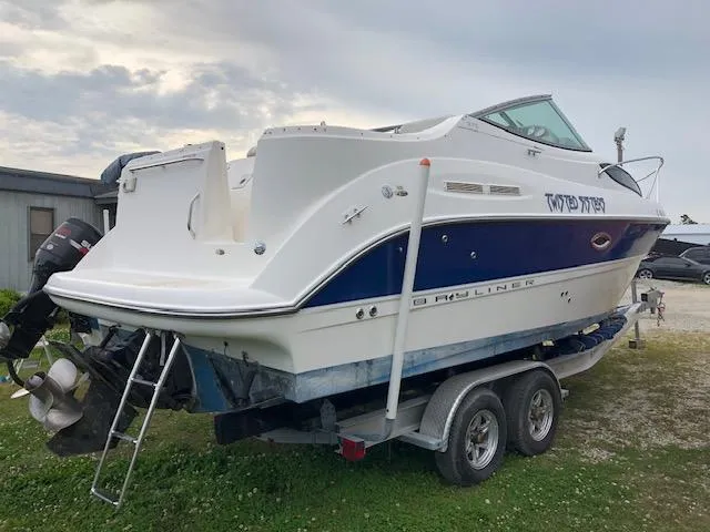 Slide: The Image of 2007 Bayliner 275 boat on a trailer, rear view. - 6